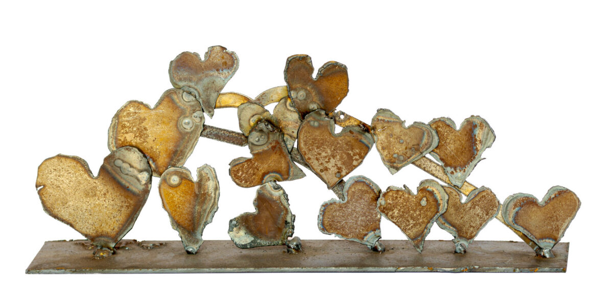 Freestanding hand-welded steel sculpture by Afatasi featuring a dense gathering of irregular heart forms connected across a long rectangular base.