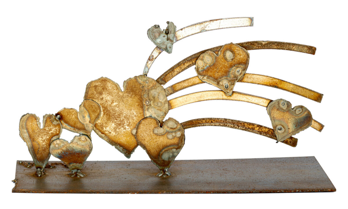 Freestanding hand-welded steel sculpture by Afatasi featuring eight irregular heart forms connected by broad curving bands on a rectangular metal base.