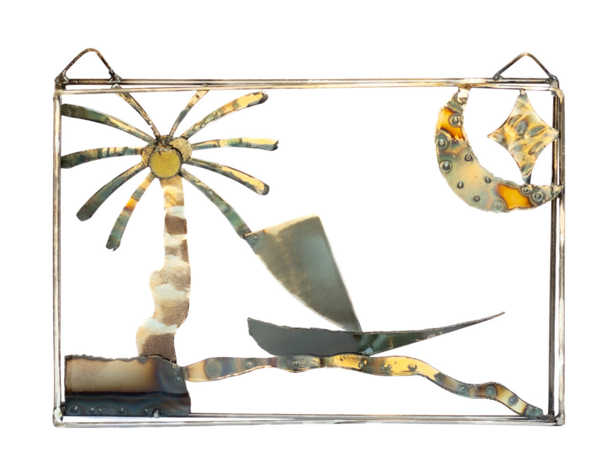 Welded metal sculpture by Afatasi depicting a palm tree, sailboat, crescent moon, star, and river landscape.